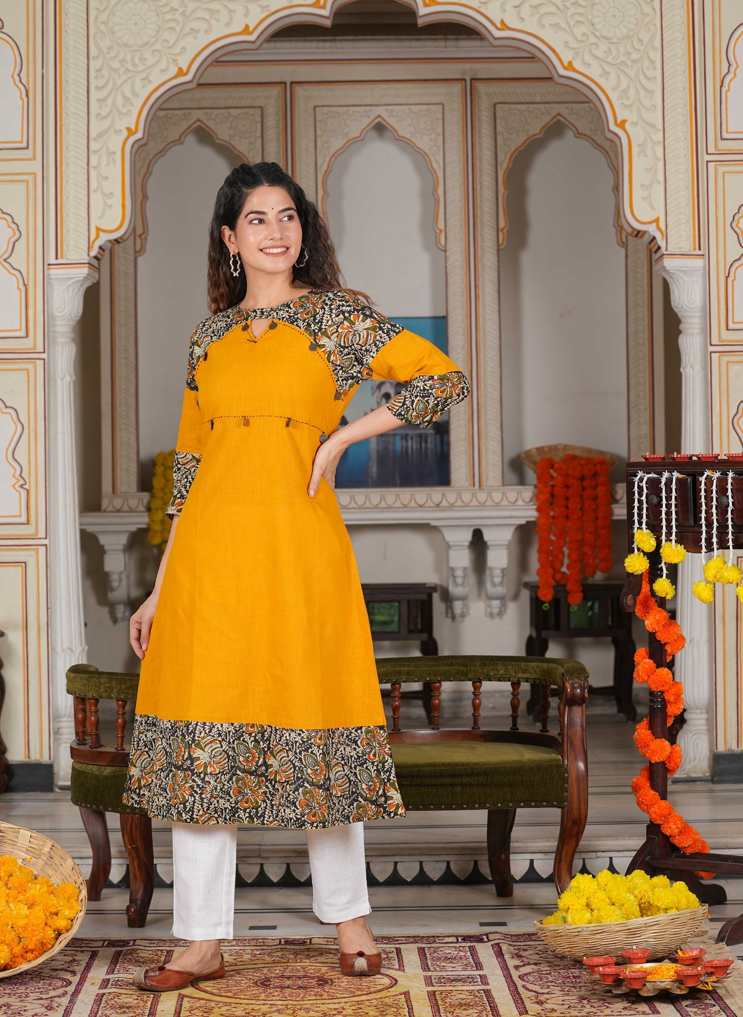 Cotton Blend Kalamkari Print Kaantha Work A-line Kurta (Mustard)