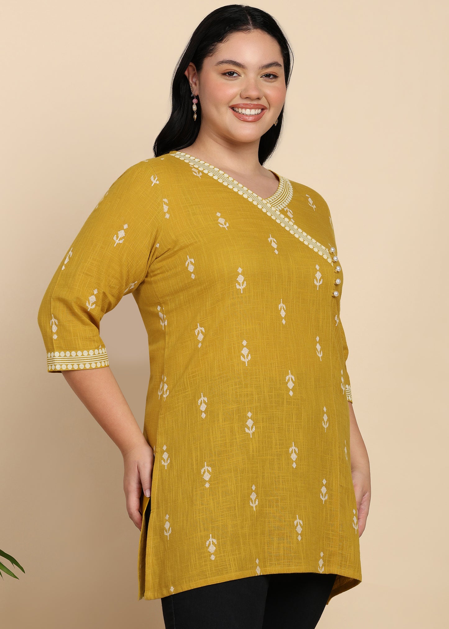 Yash Gallery Women’s Yellow Cambric Cotton Printed Straight Short Kurti