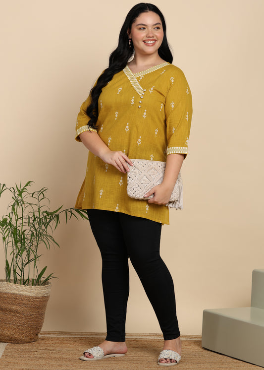 Yash Gallery Women’s Yellow Cambric Cotton Printed Straight Short Kurti