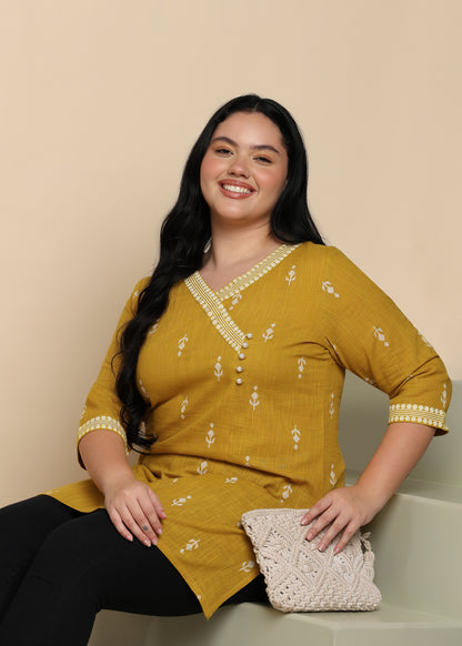 Yash Gallery Women’s Yellow Cambric Cotton Printed Straight Short Kurti