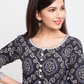 women bandhni print flared kurta red