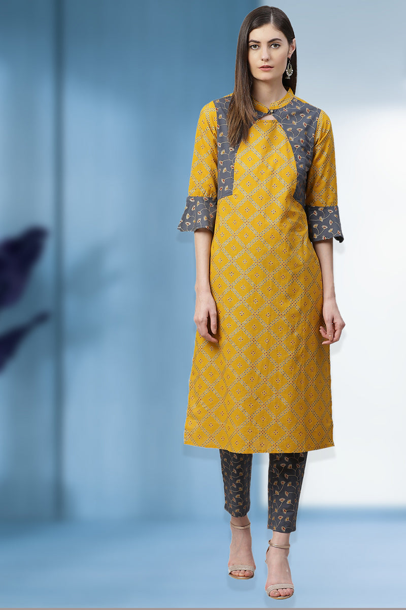 women cotton geomatrical printed straight kurta with pant yellow grey